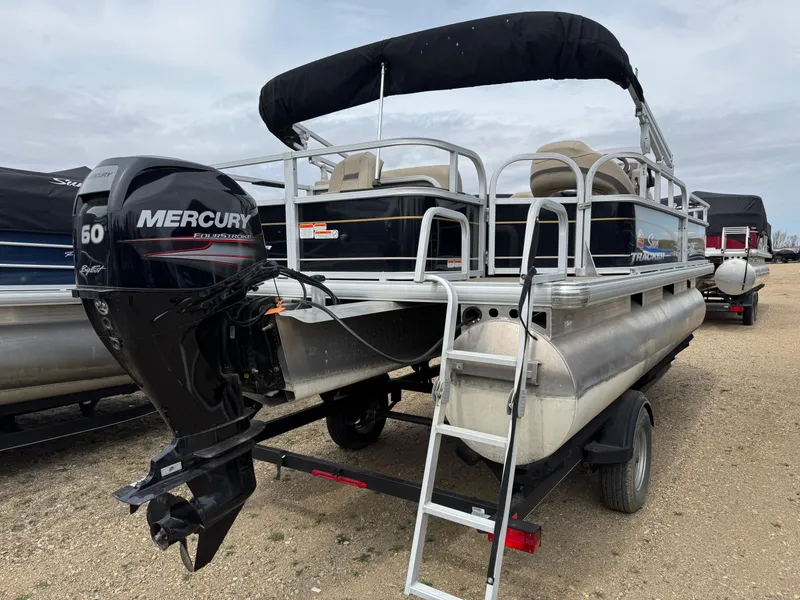 Slide: The Image of 2020 Sun Tracker Bass Buggy 18 DLX pontoon boat with Mercury 60 outboard motor. - 3