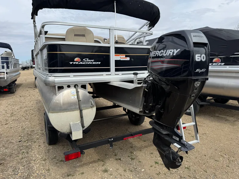 Slide: The Image of 2020 Sun Tracker Bass Buggy 18 DLX pontoon boat with Mercury 60 outboard motor. - 5