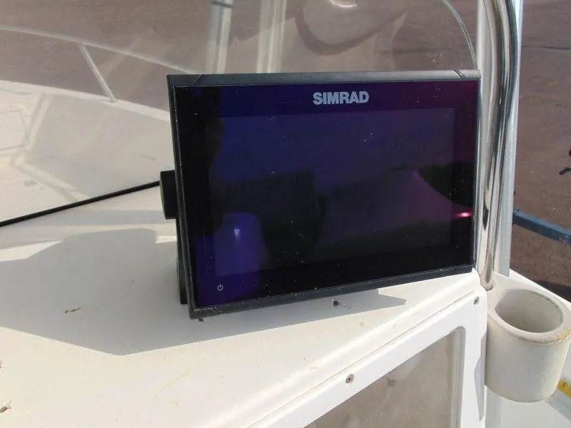 Slide: The Image of Simrad navigation system on a 2002 Aquasport 190 Osprey boat. - 7
