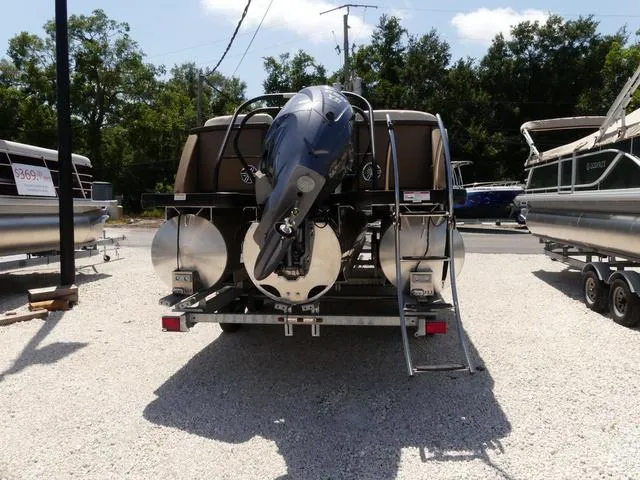 Slide: The Image of 2023 AquaPatio AquaPatio 255 SBC pontoon boat rear view with outboard motor. - 6