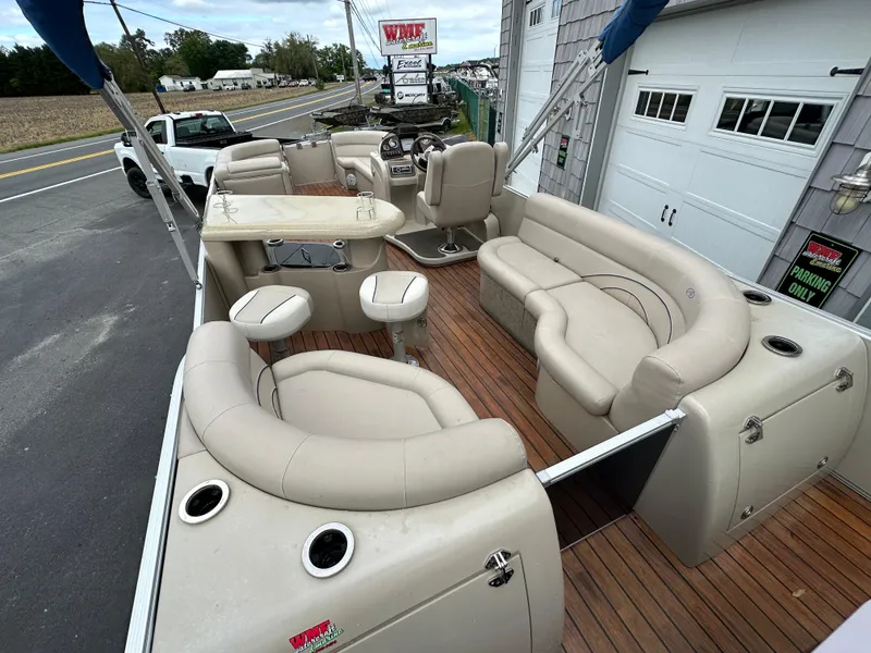 Slide: The Image of 2014 Avalon 2585 Catalina Bar / ENT Tri Toon High Performance boat with spacious seating and bar area. - 11