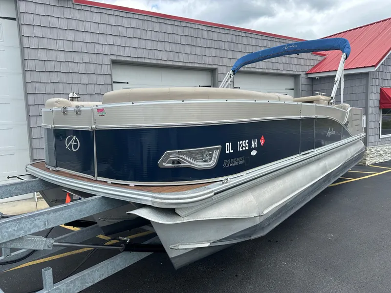 Slide: The Image of 2014 Avalon 2585 Catalina Bar / ENT Tri Toon High Performance pontoon boat on trailer. - 3