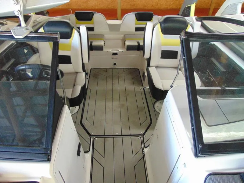 Slide: The Image of Interior of a 2020 Yamaha Boats 212X, featuring spacious seating and modern design. - 10