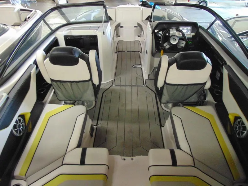 Slide: The Image of 2020 Yamaha Boats 212X interior with modern seating and sleek design. - 7