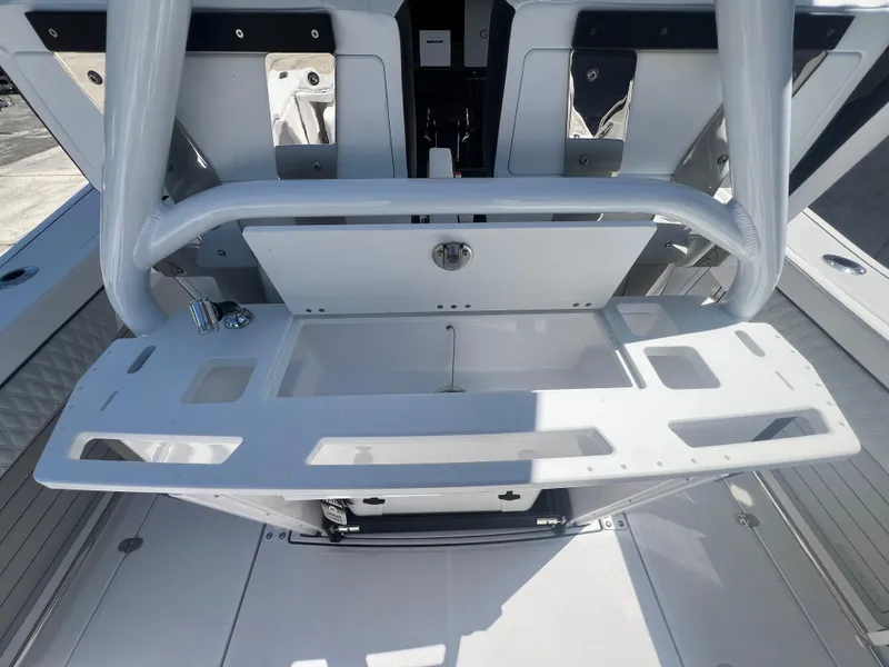 Slide: The Image of 2024 Blackfin 272 CC center console with integrated sink and storage compartments. - 30