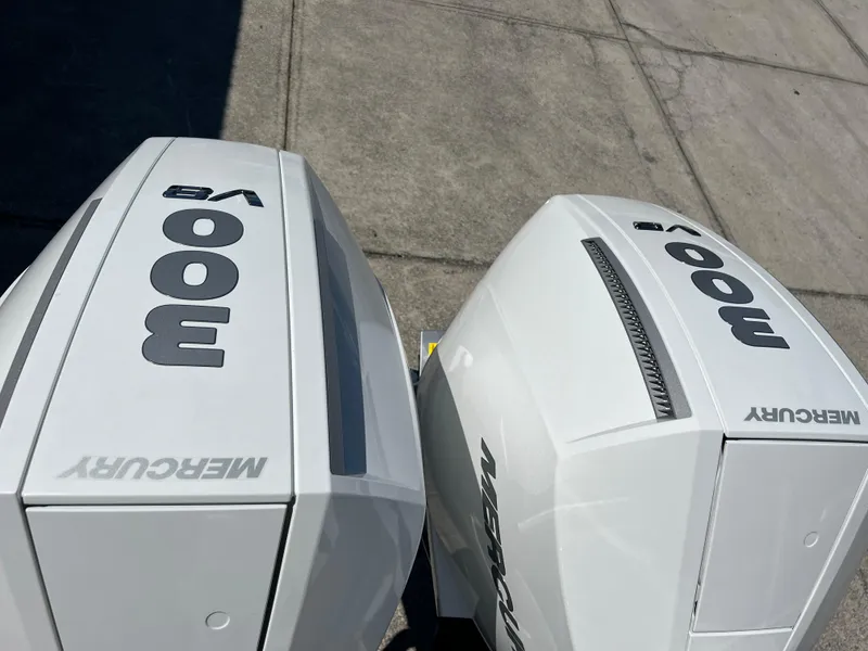 Slide: The Image of Twin Mercury 300 V8 outboard engines on a 2024 Blackfin 272 CC boat. - 31