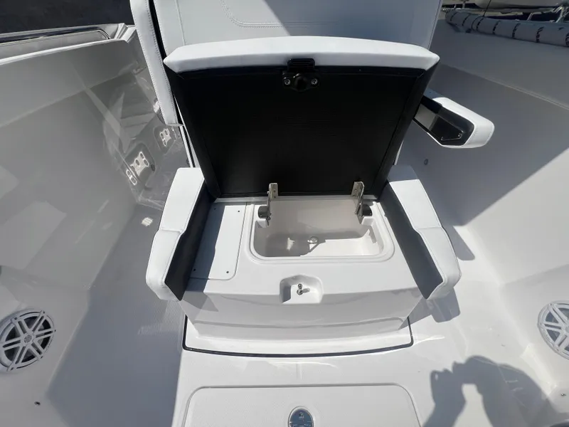 Slide: The Image of 2024 Blackfin 272 CC center console storage compartment. - 33