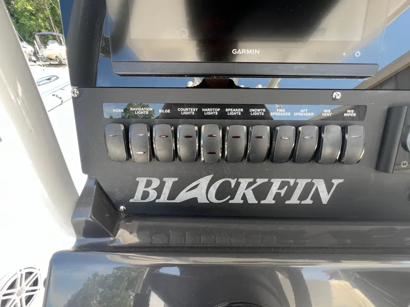 Slide: The Image of Control panel of 2024 Blackfin 272 CC boat with labeled switches. - 35