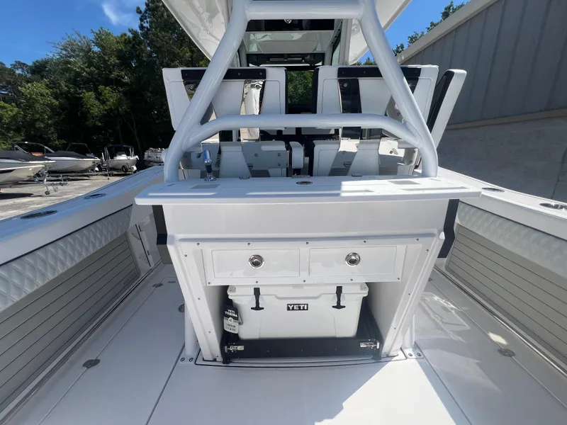 Slide: The Image of 2024 Blackfin 272 CC center console boat with Yeti cooler and seating. - 7