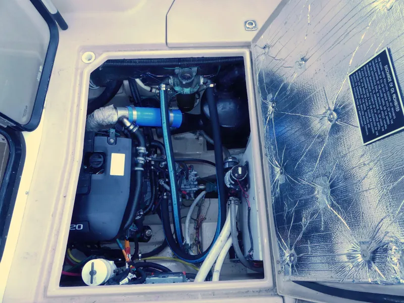 Slide: The Image of Engine compartment of a 2014 Cutwater C 26 boat. - 15