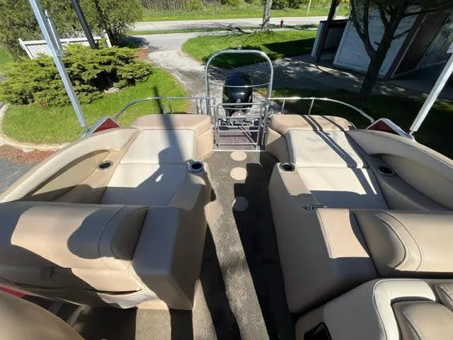 Slide: The Image of 2014 Harris FloteBote Grand Mariner 250 pontoon boat with beige seating and rear motor. - 20