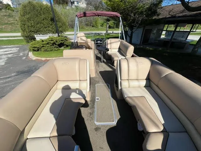 Slide: The Image of 2014 Harris FloteBote Grand Mariner 250 pontoon boat with beige seating and canopy. - 33