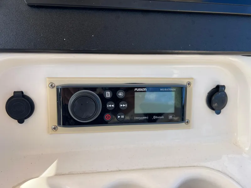 Slide: The Image of Fusion MS-RA70NSX stereo system on 2019 Grady-White Canyon 306 boat dashboard. - 14