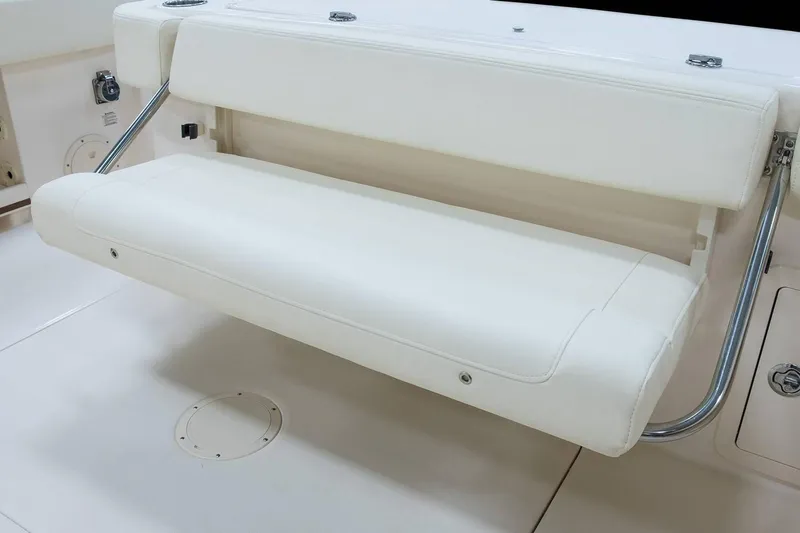 Slide: The Image of 2019 Grady-White Canyon 306 boat with white cushioned seating. - 43