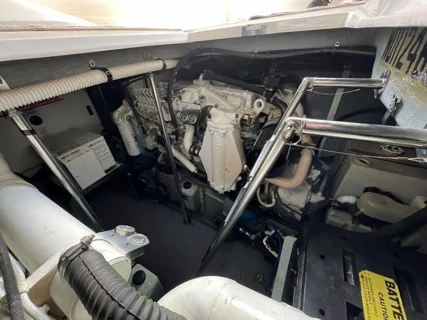 Slide: The Image of Engine compartment of a 2001 Sea Ray 460 Sundancer yacht. - 15