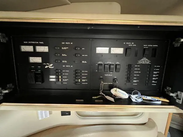 Slide: The Image of Electrical control panel inside a 2001 Sea Ray 460 Sundancer yacht. - 6