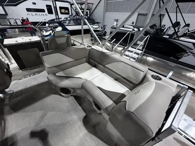 Slide: The Image of 2024 Avalon Venture Fish N Cruise 21 FT boat interior with plush seating and modern design. - 10