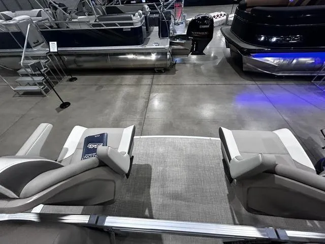Slide: The Image of 2024 Avalon Venture Fish N Cruise 21 FT pontoon boat interior with seating and modern design. - 14