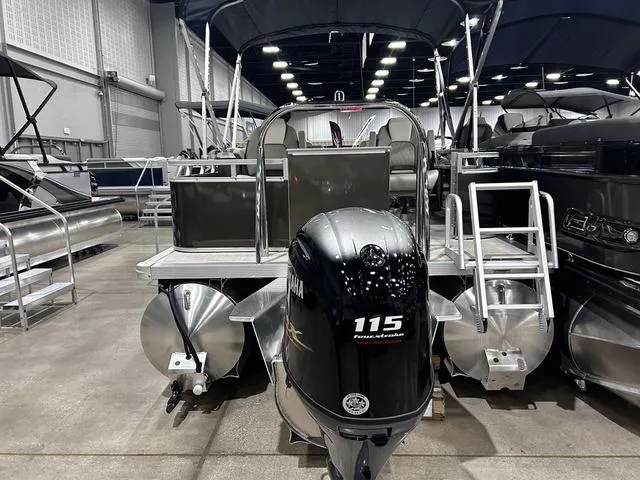 Slide: The Image of 2024 Avalon Venture Fish N Cruise 21 FT pontoon boat with Yamaha 115 engine in showroom. - 7