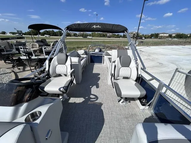 Slide: The Image of 2024 Avalon Venture Quad Lounger 23 FT pontoon boat with spacious seating and modern design. - 5