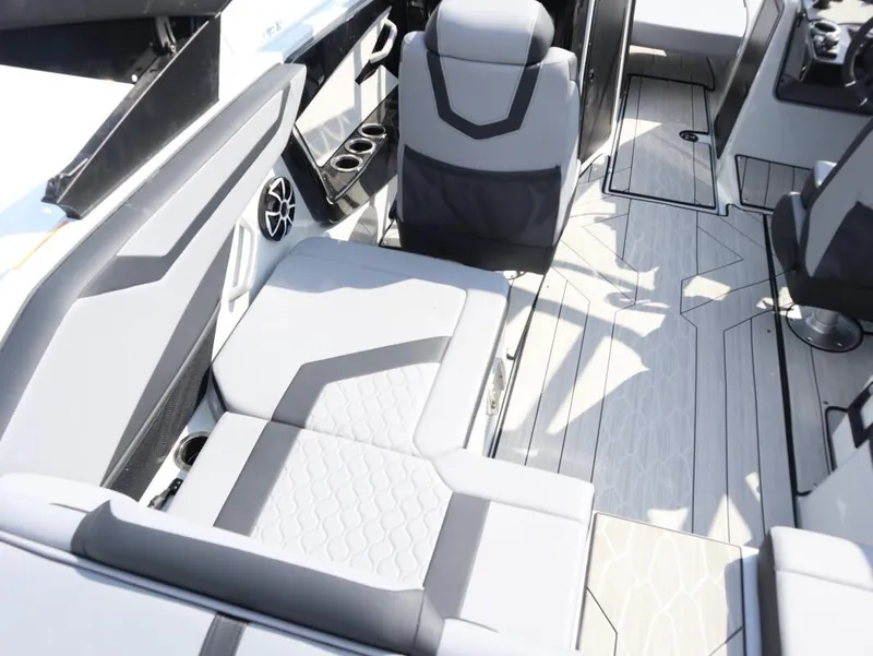 Slide: The Image of 2024 Yamaha Boats 222XE interior seating and flooring. - 13