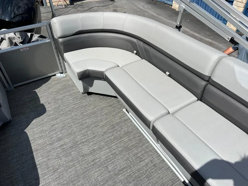 Slide: The Image of 2024 Bennington 22S boat interior with gray seating and flooring. - 14