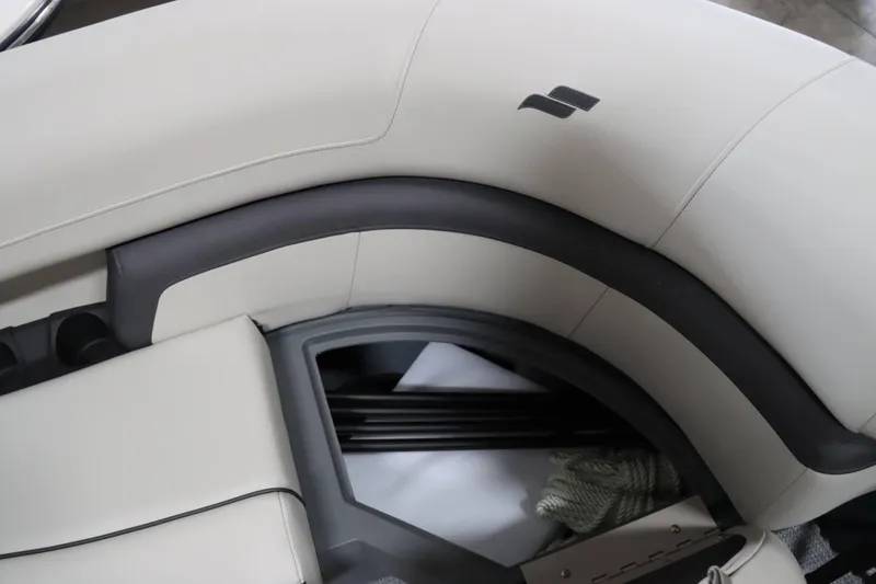 Slide: The Image of 2025 Starcraft EXS 3 boat interior with sleek, modern seating design. - 11