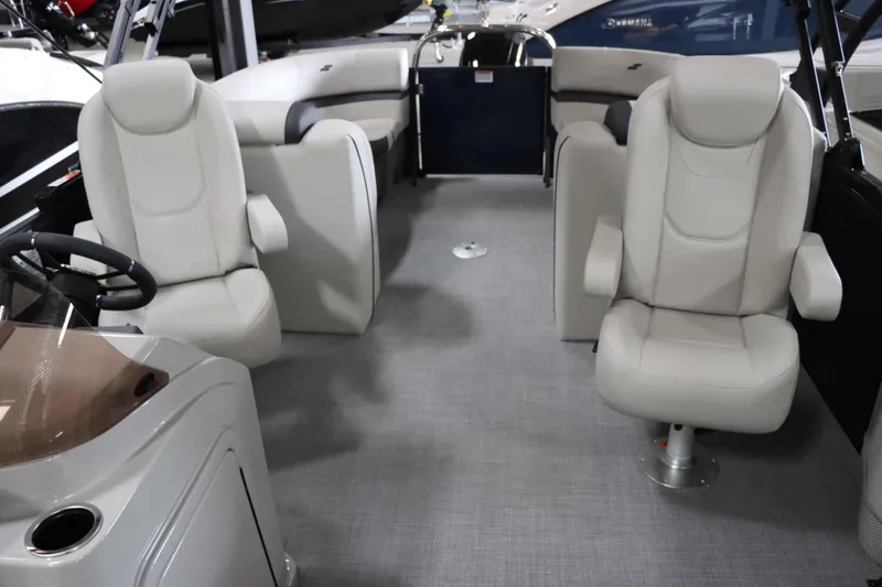 Slide: The Image of Interior of 2025 Starcraft EXS 3 boat with plush seating and modern design. - 15