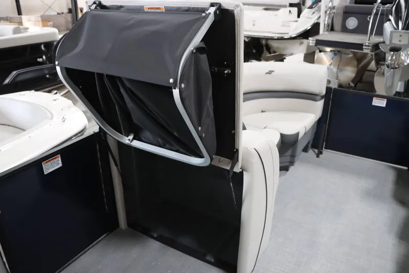 Slide: The Image of Starcraft EXS 3 boat interior, 2025 model, featuring seating and storage area. - 18