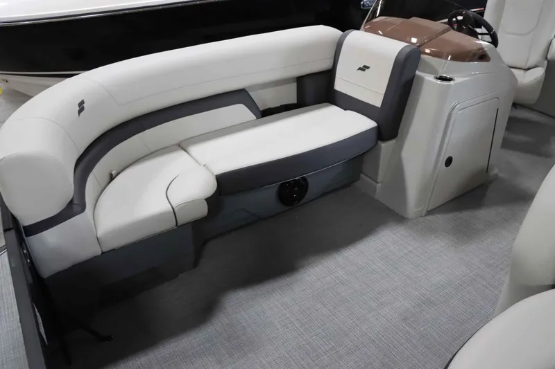 Slide: The Image of 2025 Starcraft EXS 3 boat interior with plush seating and modern design. - 7