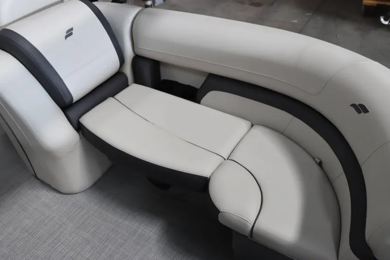 Slide: The Image of 2025 Starcraft EXS 3 boat interior with luxurious beige seating. - 11