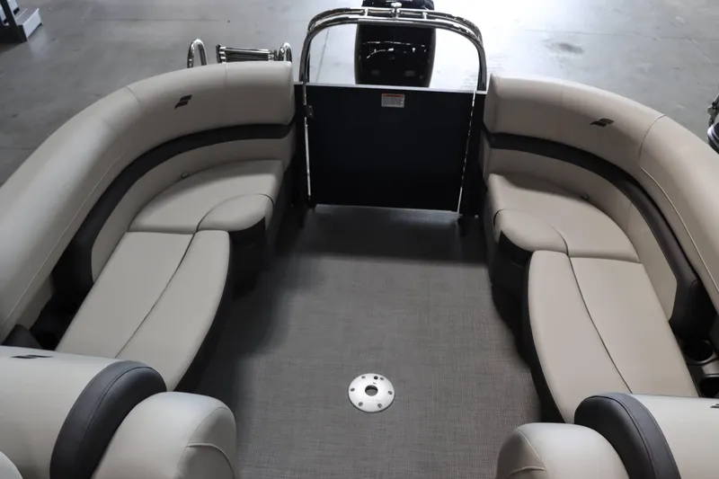 Slide: The Image of 2025 Starcraft EXS 3 boat interior with spacious, curved seating and modern design. - 16