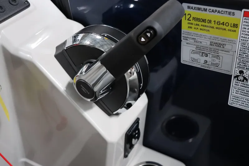 Slide: The Image of Starcraft EXS 3 2025 boat throttle control and capacity label. - 17