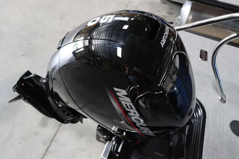 Slide: The Image of Mercury outboard motor on 2025 Starcraft EXS 3 boat, sleek black design. - 9