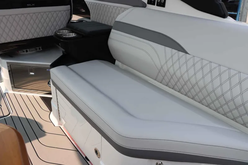 Slide: The Image of Luxurious interior seating of 2024 Sea Ray 280SLX boat with elegant stitching. - 13