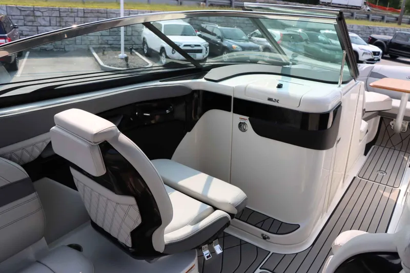 Slide: The Image of 2024 Sea Ray 280SLX boat interior with sleek seating and modern design. - 15