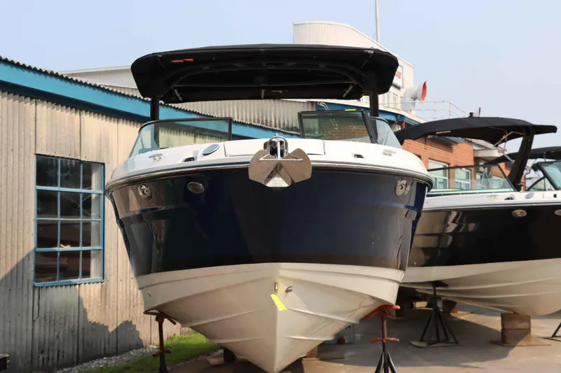 Slide: The Image of 2024 Sea Ray 280SLX boat displayed outdoors, front view. - 3