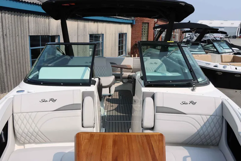 Slide: The Image of 2024 Sea Ray 280SLX boat interior with luxurious seating and sleek design. - 30