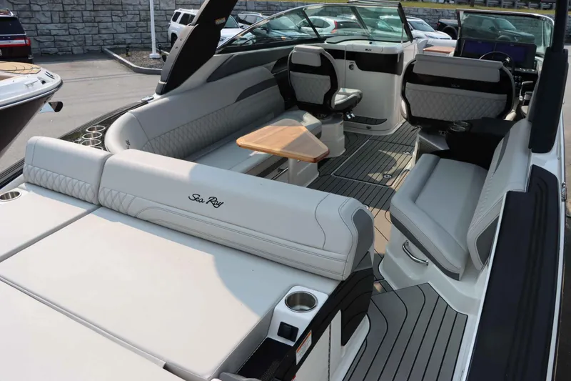 Slide: The Image of 2024 Sea Ray 280SLX boat interior with luxurious seating and modern design. - 5