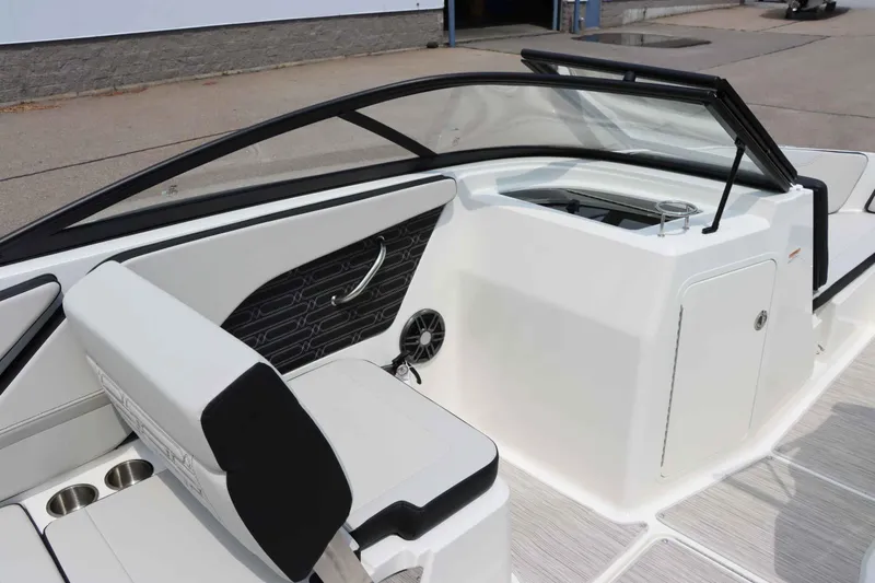 Slide: The Image of 2025 Sea Ray 210SPX boat interior with sleek seating and modern design. - 13