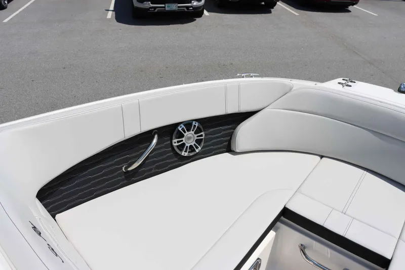 Slide: The Image of Interior seating of 2024 Sea Ray 230SPX boat with speaker and handle. - 17