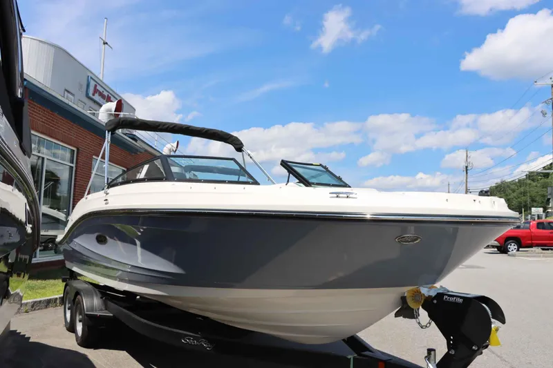Slide: The Image of 2024 Sea Ray 230SPX boat on trailer, displayed outdoors. - 3