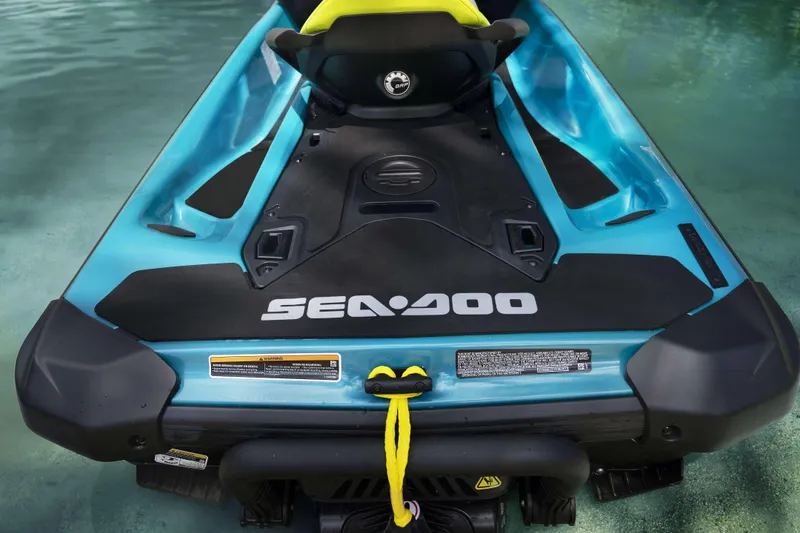 Slide: The Image of 2024 Sea-Doo GTI SE 130 SS in vibrant blue on water. - 4