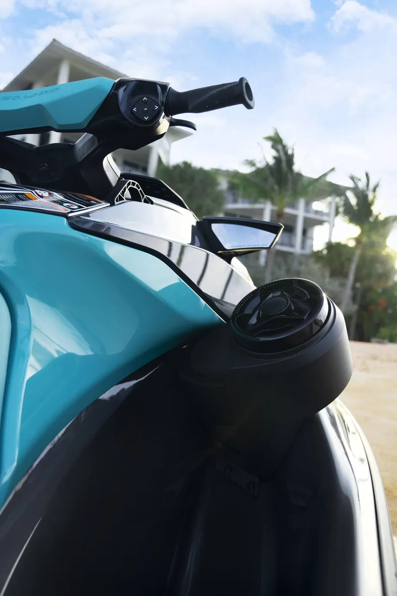 Slide: The Image of 2024 Sea-Doo GTR 230 SS jet ski, turquoise, close-up view, outdoors. - 4