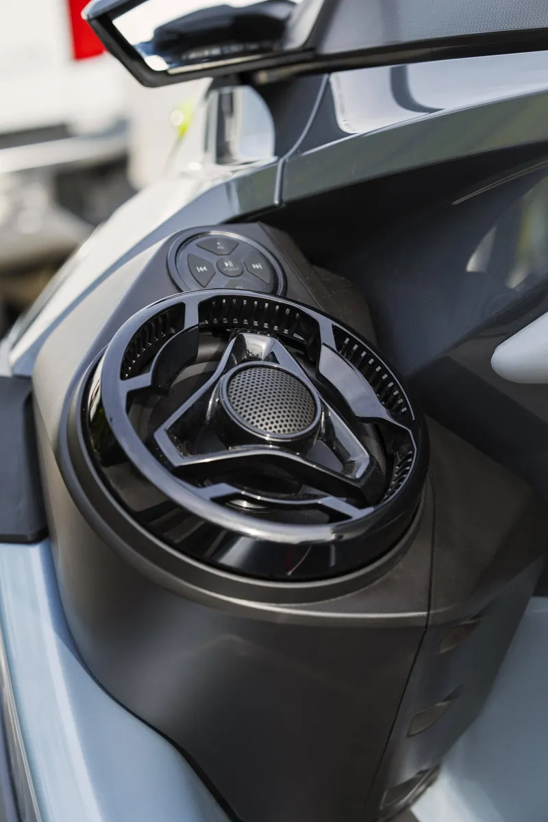 Slide: The Image of 2024 Sea-Doo RXT-X 325 SS speaker and control panel close-up. - 6