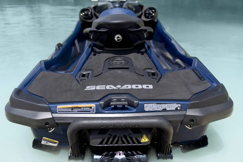 Slide: The Image of 2024 Sea-Doo GTX 230 jet ski in water, rear view. - 3