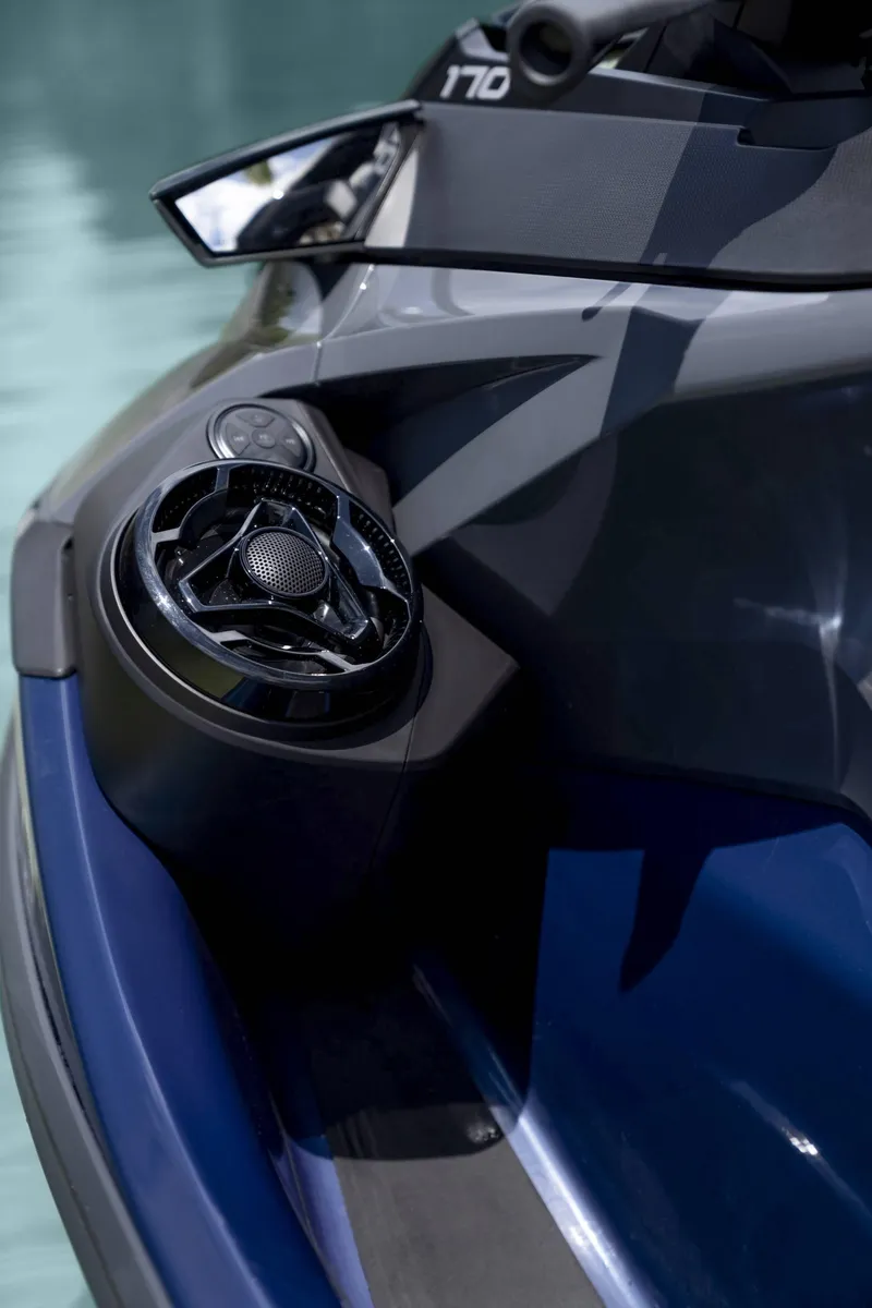 Slide: The Image of 2024 Sea-Doo GTX 230 jet ski, close-up of sleek design and speaker detail. - 4