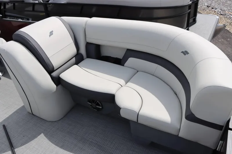 Slide: The Image of 2024 Starcraft EXS 3 boat interior with luxurious white and gray seating. - 10