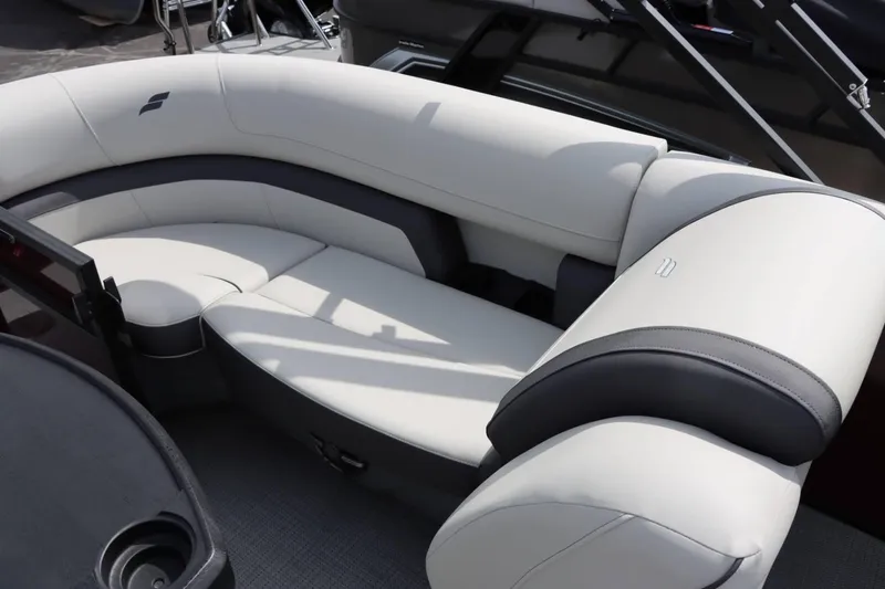 Slide: The Image of 2024 Starcraft EXS 3 boat interior with white and gray cushioned seating. - 14