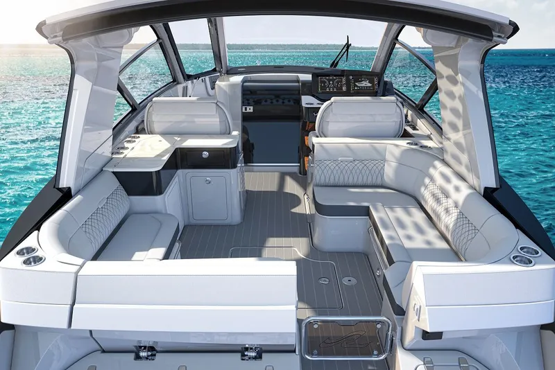 Slide: The Image of Luxurious 2024 Sea Ray 370 Sundancer boat interior with elegant seating and ocean view. - 26